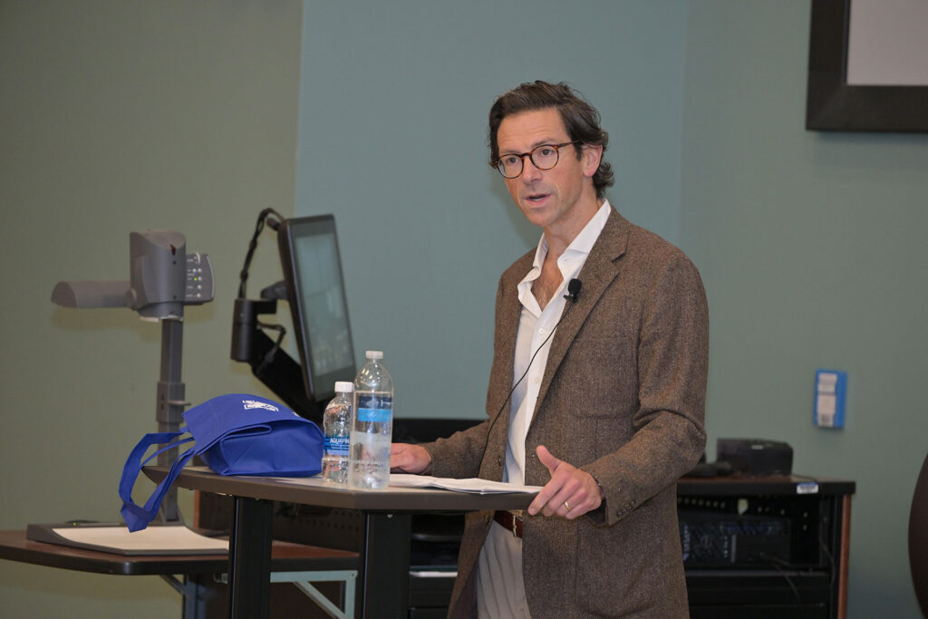Dr. John J. Kaag at podium